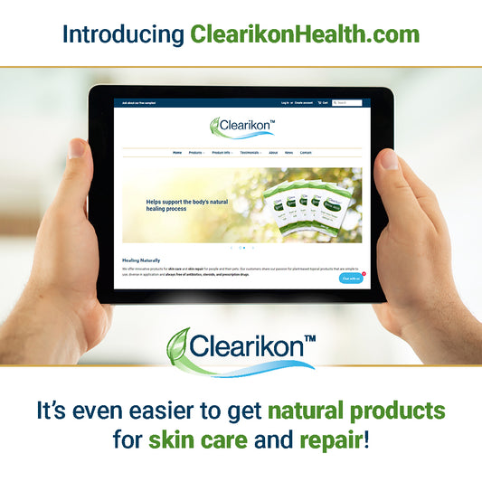 Introducing ClearikonHealth.com. It’s even easier to get natural products for skin care and repair! Image is of a man's hands holding a tablet showing the Clearikon Health homepage.